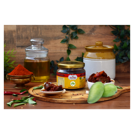 Assorted food items including a jar, spices, and fruits on a wooden surface with a rustic background.