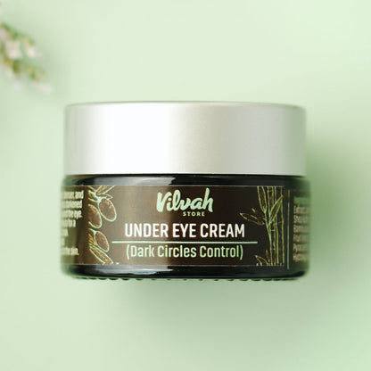 Jar of Vilvah Under Eye Cream on a light green background