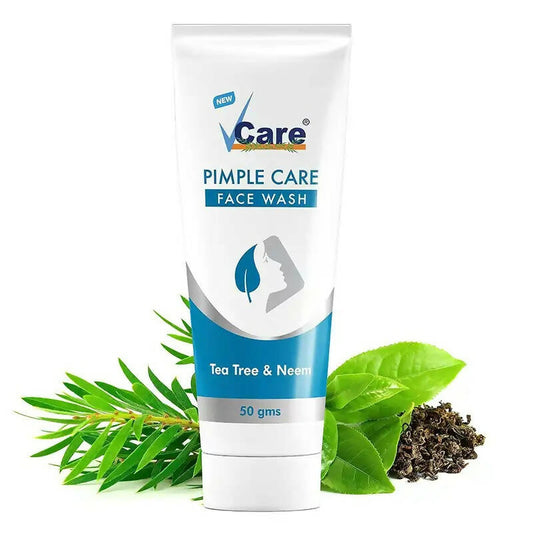VCare Pimple Care Face Wash tube with tea tree and neem leaves on a white background