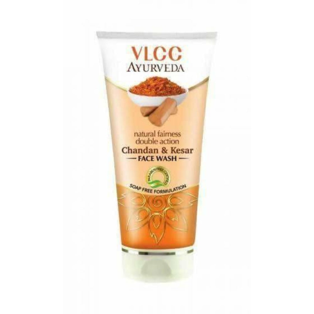 A tube of VLCC Natural Fairness Kesar Chandan Face Wash with an orange gold color label, indicating a soap-free formulation.