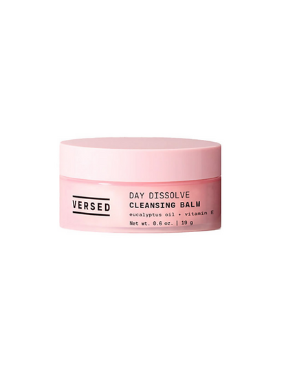 Pink cleansing balm container with 'VERSED' branding on a white background