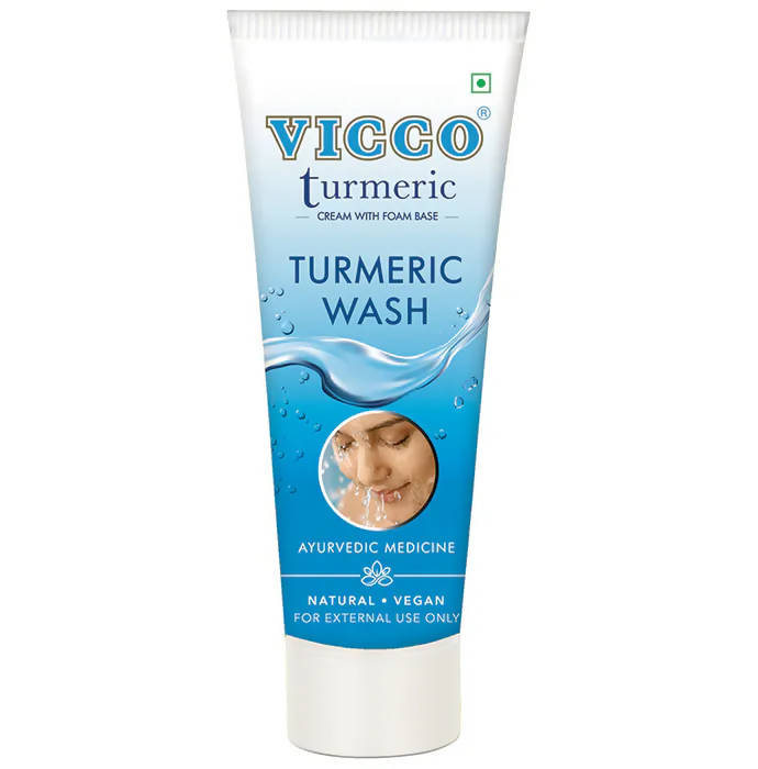 A tube of Vicco Turmeric Face Wash with packaging that includes an image of a person and text indicating it is an Ayurvedic medicine, natural, vegan, and for external use only.