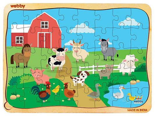 Children's puzzle with farm animals and a red barn, made by Webby.