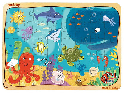 Children's puzzle with ocean-themed illustrations and 'webby' branding.