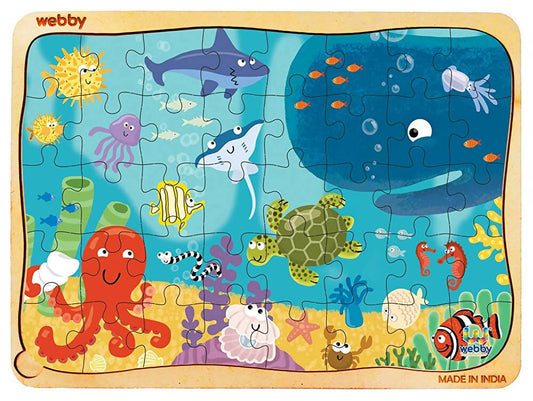 Children's puzzle with ocean-themed illustrations and 'webby' branding.