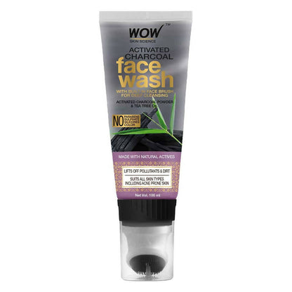 Tube of WOW Activated Charcoal Face Wash with brush on a white background