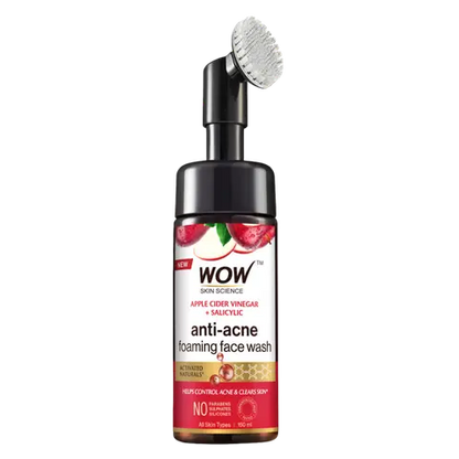 A bottle of WOW Skin Science Apple Cider Vinegar Foaming Face Wash with a brush applicator on top. The label has red and white colors with text and branding.