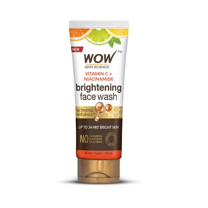 A tube of Wow Skin Science Brightening Vitamin C Face Wash with a white and orange design, indicating it is a skincare product.