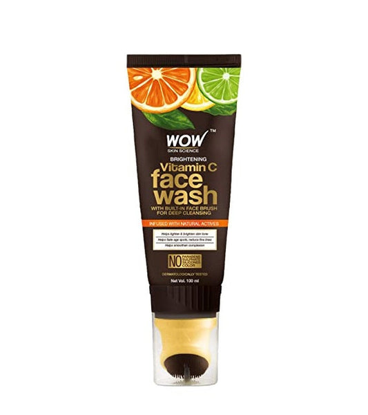 Tube of WOW Skin Science Vitamin C face wash with citrus fruits on a white background