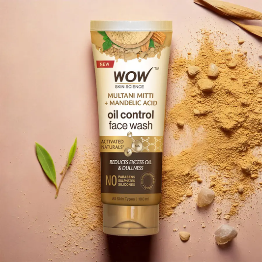 Wow Skin Science oil control face wash tube with multani mitti and mandelic acid on a beige background