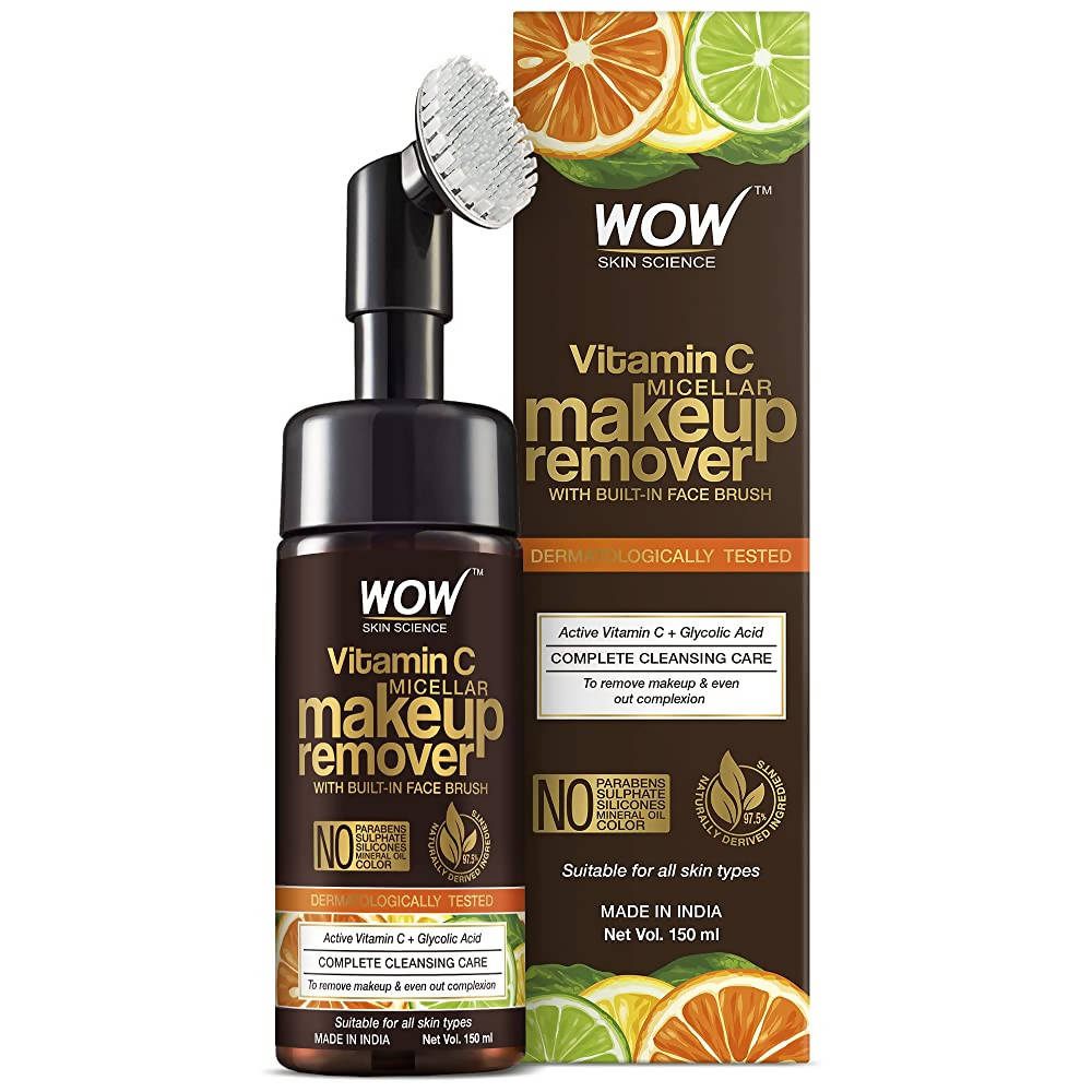 Wow Skin Science Vitamin C Micellar Makeup Remover with face brush and packaging on a white background