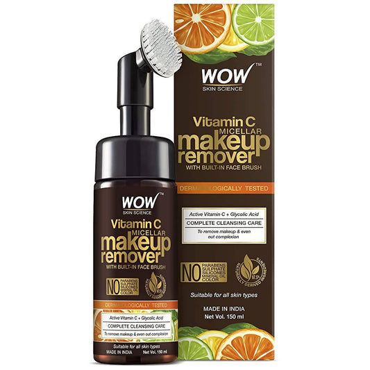 Wow Skin Science Vitamin C Micellar Makeup Remover with face brush and packaging on a white background
