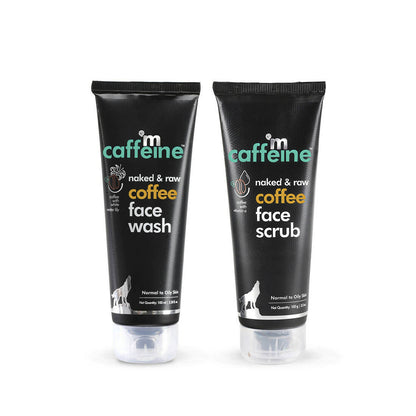 Two black tubes of 'm caffeine naked & raw coffee' face wash and scrub on a white background