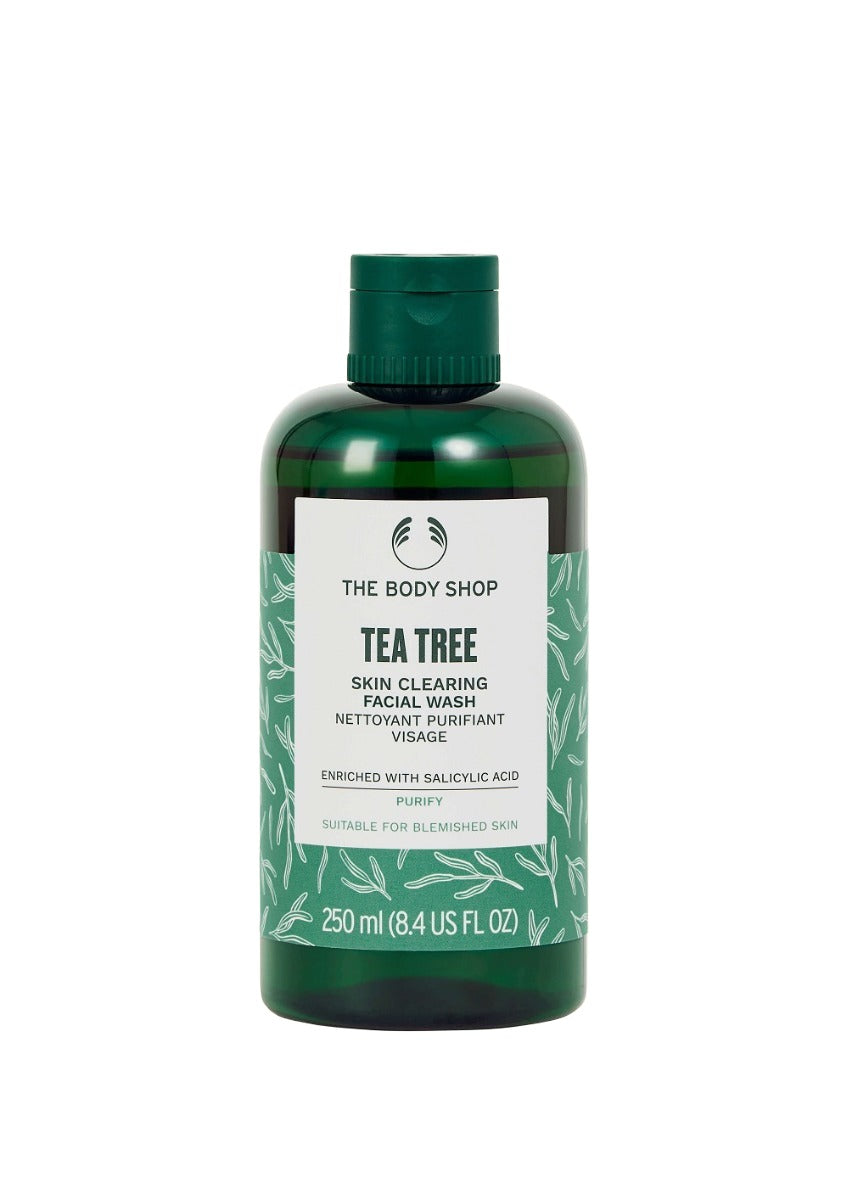 The Body Shop Tea Tree Skin Clearing Facial Wash in a green bottle with white and black labeling, containing 250 ml of product.